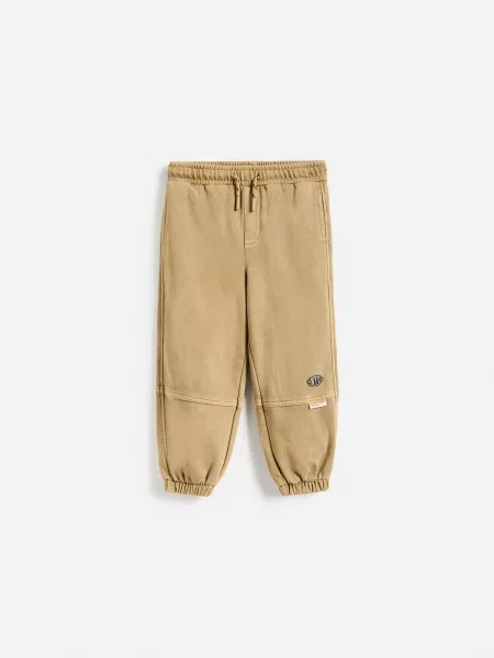 Reserved Pantaloni de trening din brun-auriu