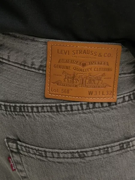 Proste jeansy Levi's 501 w paski ze stretchu dzwony niebieskie