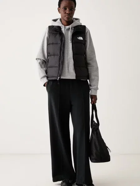 The North Face pulover s kapuco z bombažem Evolution siva