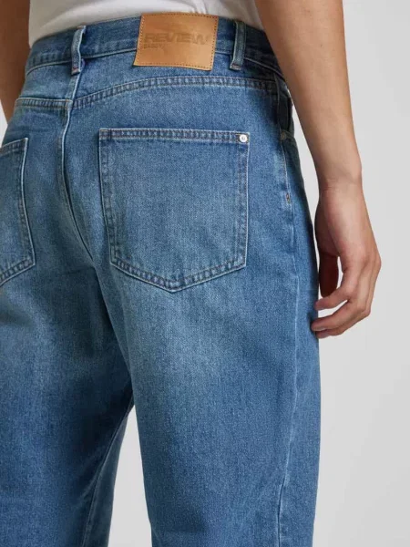 Jeansy o kroju baggy Essentials Review niebieskie