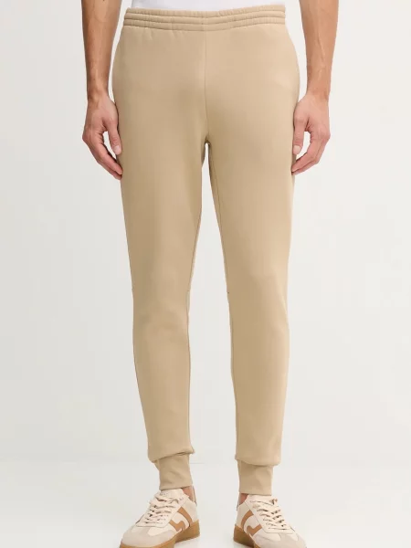 Спортивні штани Lacoste однотонна бежевий