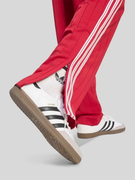 Spodnie dresowe o kroju regular fit z paskami w kontrastowym kolorze model FIREBIRD TP DN' Adidas Originals