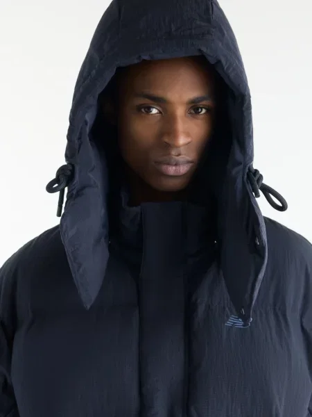 Пуховик New Balance синій