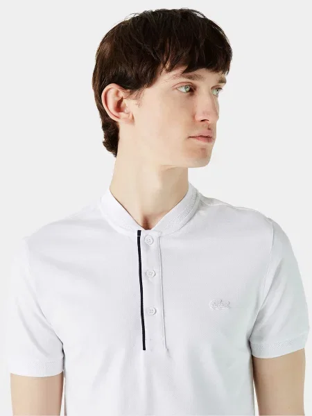Поло Lacoste белое