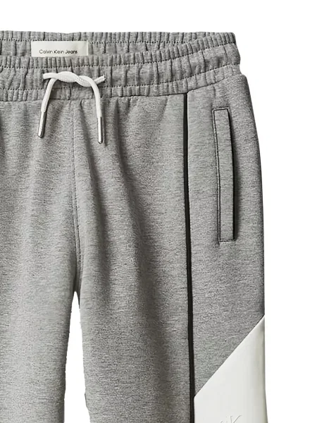 Dětské kalhoty Calvin Klein šedé