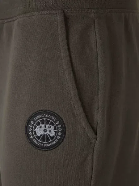 Futó nadrág Canada Goose autogrammal kék