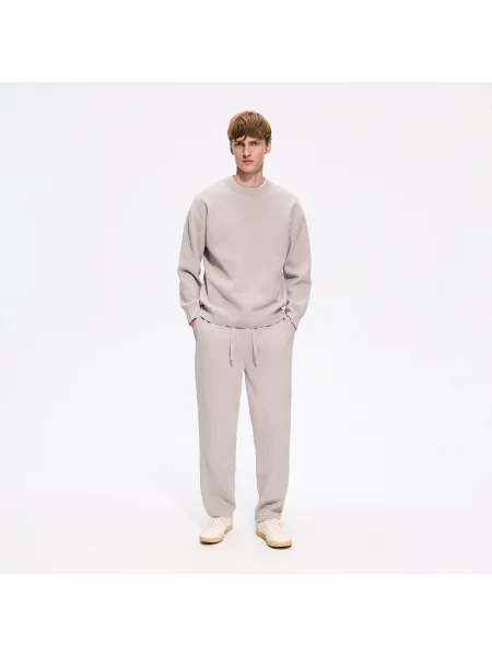 Reserved Žerzejové kalhoty joggers světle šedá