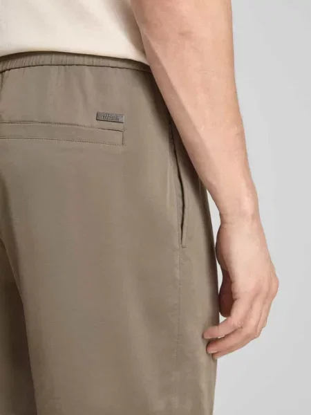 Spodnie materiałowe o kroju regular fit z mieszanki z elastycznym pasem Armani Exchange