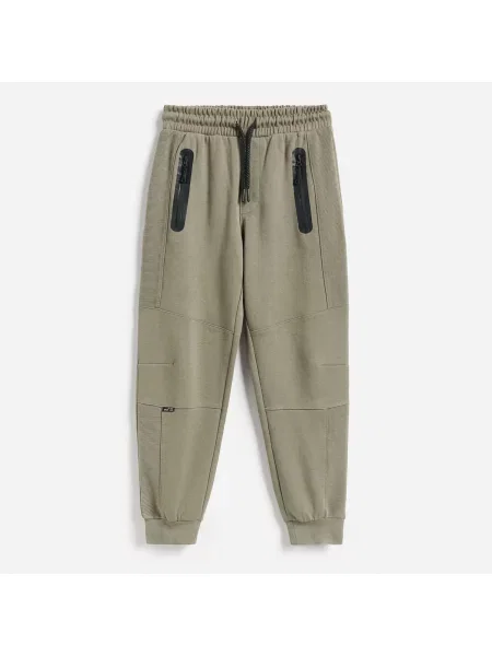 Reserved Sportovní kalhoty joggers hnědozelená