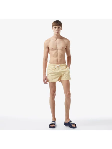 Шорты Lacoste желтые