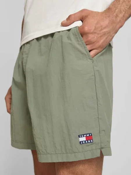 Szorty sportowe o kroju regular fit z tunelem Tommy Jeans zielone