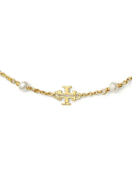 Apyranke Tory Burch su perlais auksinė