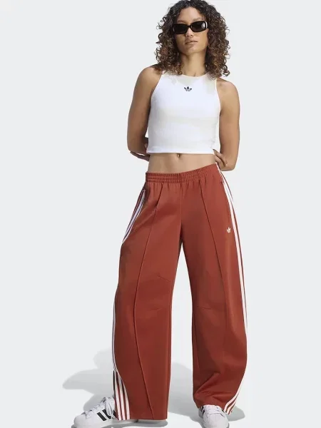 Adidas Originals spodnie dresowe Firebird Barrel pomarańczowe