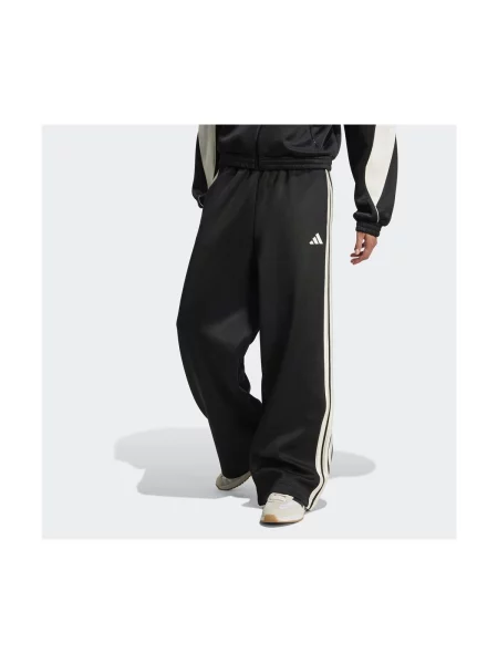 Pruhované běžecké tepláky Adidas černé