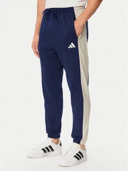 Adidas Spodnie dresowe Seasonal Essentials Colorblock Fleece Cosy Fleece Fit niebieski
