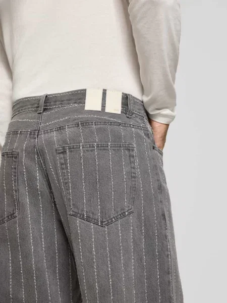 Jeansy o kroju wide fit z czystej bawełny Wood Wood