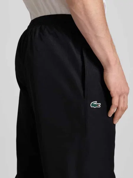 Spodnie dresowe Lacoste z logo czarne