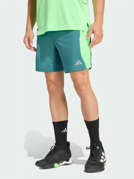 Спортивные шорты Adidas зеленые