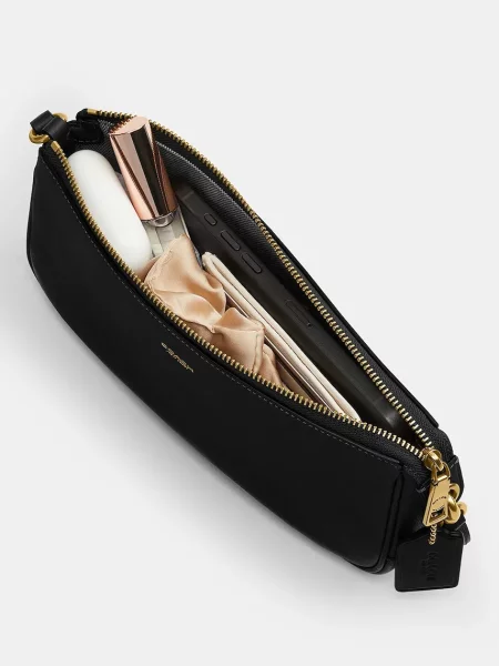 Кожаная сумка Coach