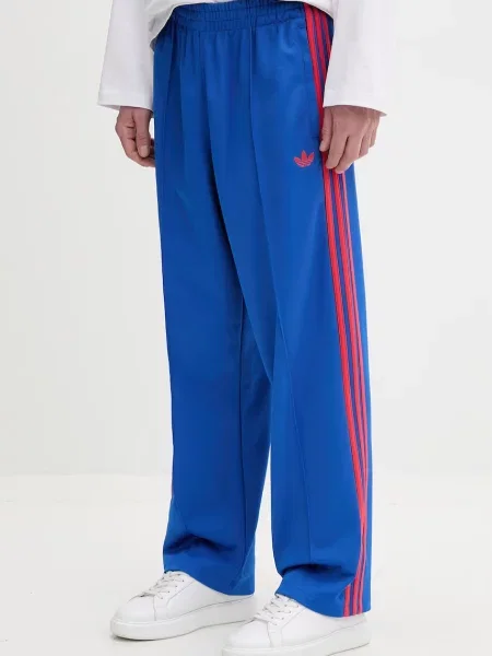 Adidas Originals spodnie dresowe z bawełną niebieski