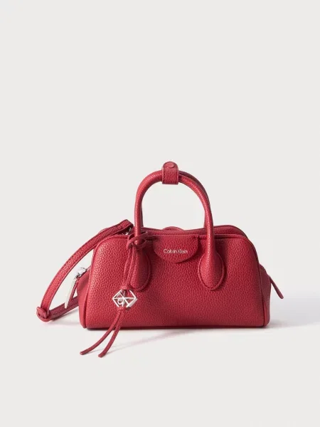 Calvin Klein Taška cez rameno čerešňová