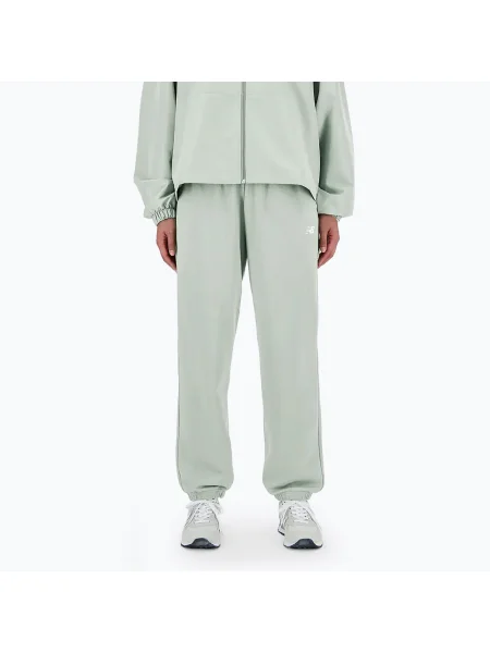 Női New Balance French Terry Jogger nadrág természetes menta. Méret: M zöld