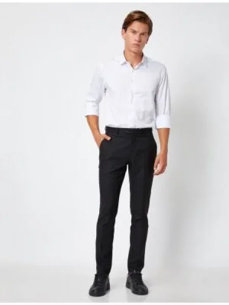 Pantaloni chino Koton în carouri negru