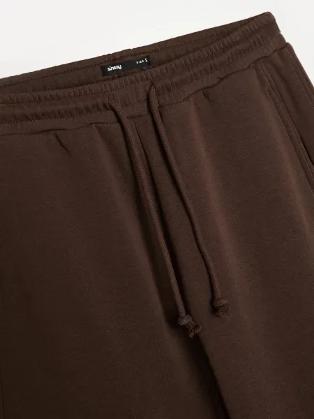 Вільні спортивні штани коричневий