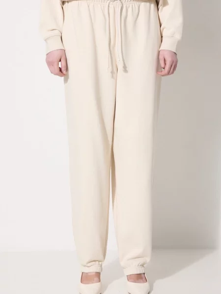 Donji dio trenirke New Balance bez uzorka bež