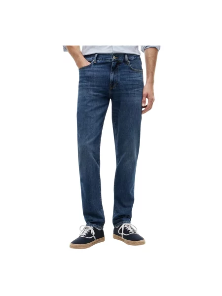 Jeansy o kroju straight fit z mieszanki bawełny Tommy Hilfiger niebieskie