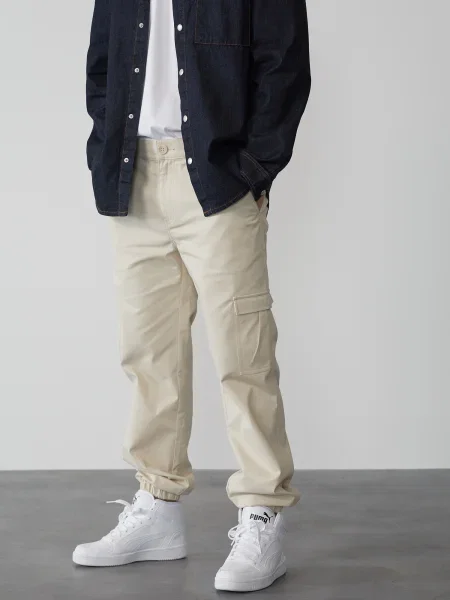 DAN FOX APPAREL Laisvo stiliaus kelnės Damon' balta