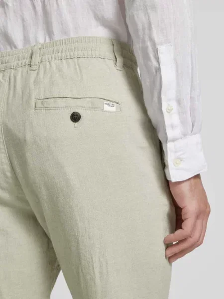 Spodnie o kroju slim taperd fit z tunelem model ‘Brody’ Selected Homme