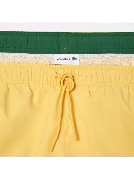 Шорты Lacoste желтые