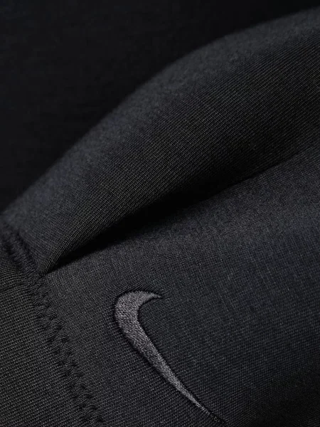 Nike Sportswear oversize melegítőfelső női modállal fekete