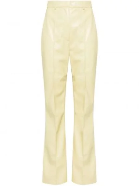 Pantaloni Nanushka din piele galben