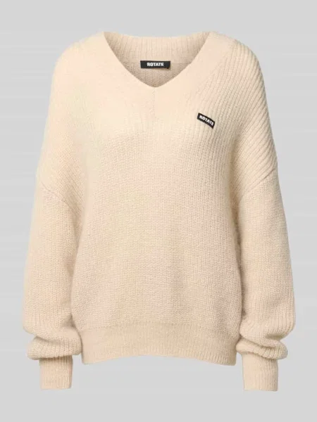 Sweter o kroju oversized z dodatkiem wełny Rotate beżowy