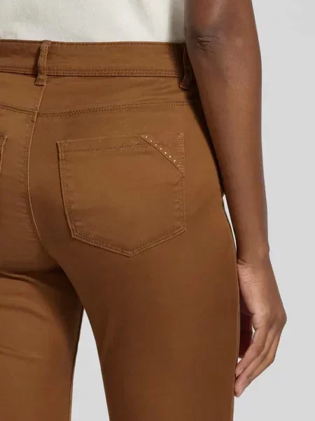 Jeansy o kroju slim fit z wpuszczanymi i z tyłu Christian Berg Woman