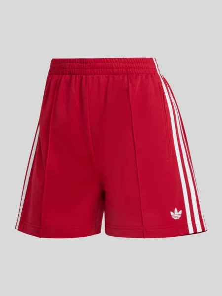 Szorty dresowe o kroju loose fit z naszywką z logo model FIREBIRD' Adidas Originals czerwone