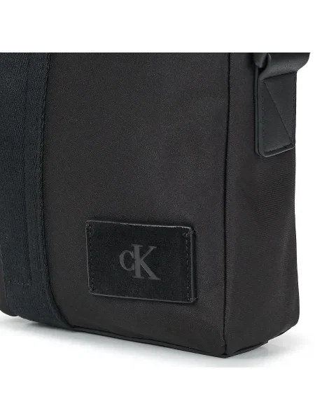 Calvin Klein Ľadvinka Canvas Mix Reporter čierna