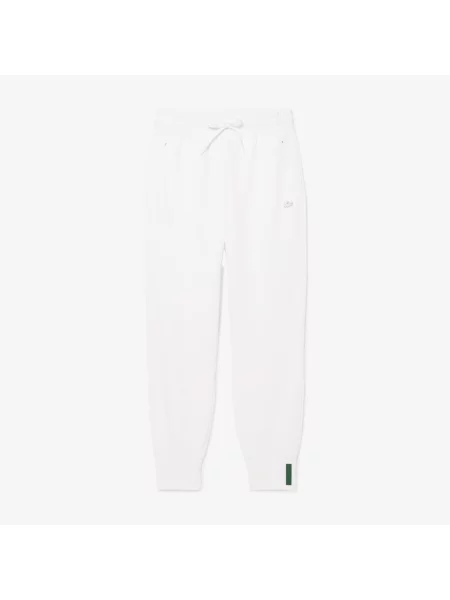 Зауженные спортивные штаны Lacoste белые