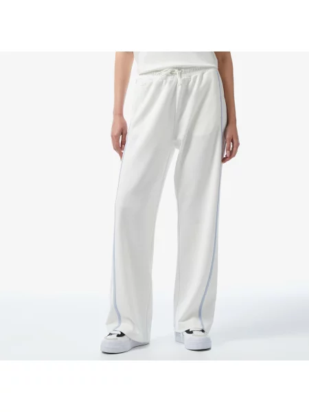 Расклешенные спортивные штаны Lacoste белые