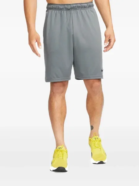 Krátké fleecové kraťasy Nike s potiskem žluté