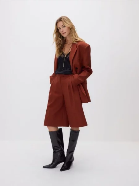 Reserved Шорти зі стрілками мідний 