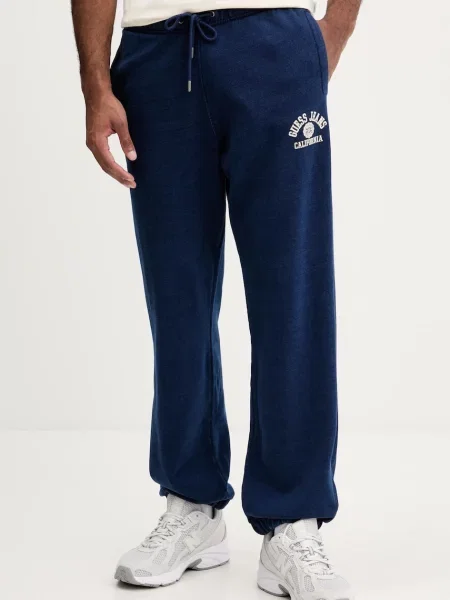 Bombažen spodnji del trenirke Guess Jeans modra