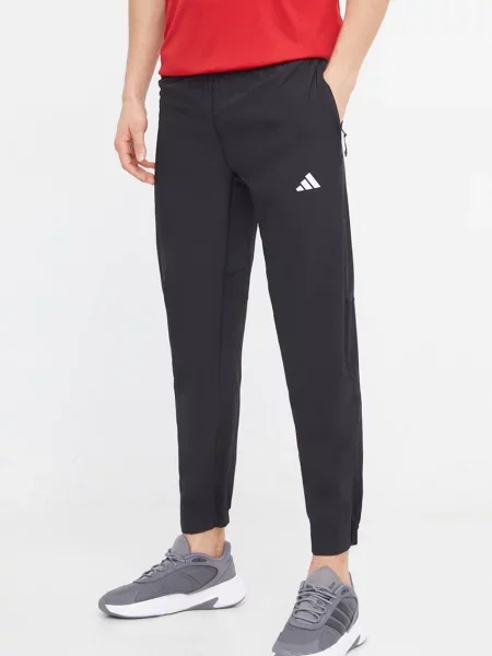 Tréninkové kalhoty adidas Performance TR-ES hladké černá