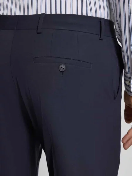 Spodnie do garnituru o kroju slim fit z zapięciem na guzik i błyskawiczny Selected Homme niebieskie