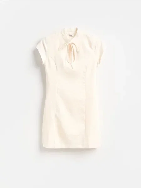 Reserved Rochie mini cu guler înalt crem