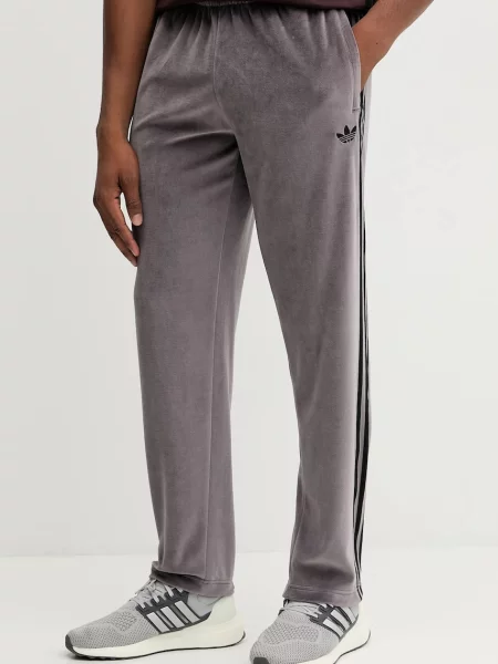 Tepláky adidas Originals Sst Tp fialové