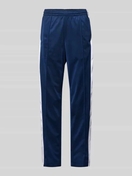 Spodnie typu track pants o kroju straight fit z lampasami model ‘Break’ Adidas Originals granatowe