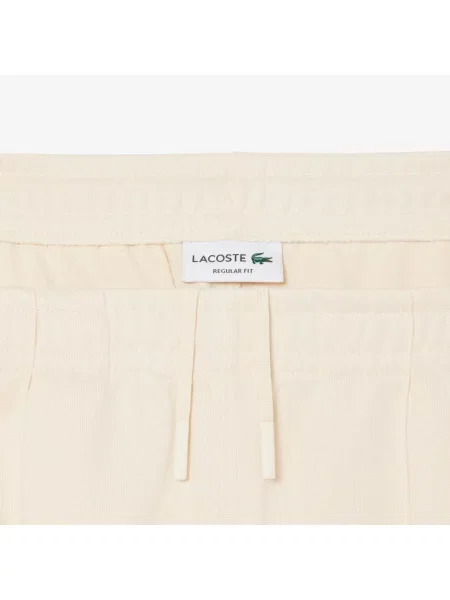 Спортивные штаны Lacoste бежевые
